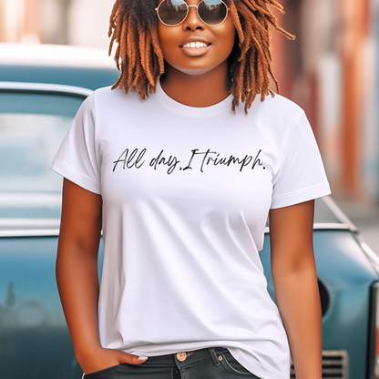 Crisp white 'All Day I Triumph' t-shirt by Triumph Tees, designed to foster courage and faith. This faith apparel is for those who believe in their God-given strength to triumph over obstacles.