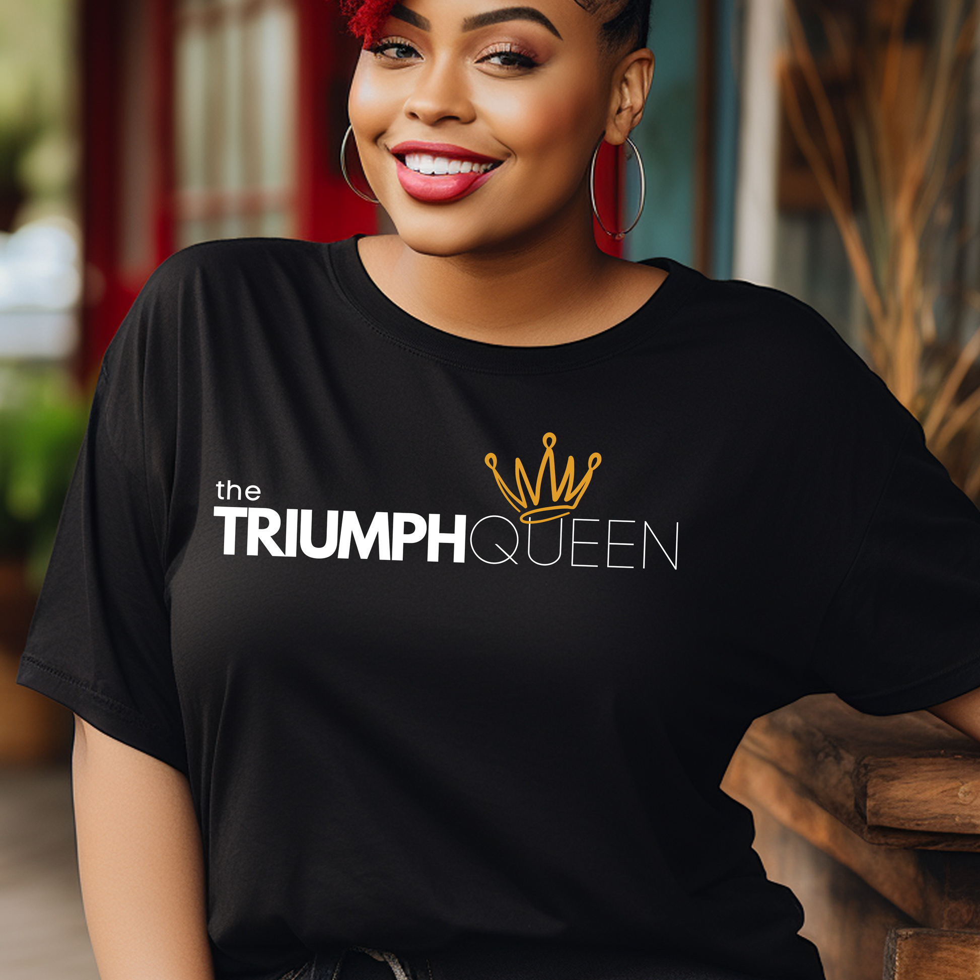 Black Triumph Queen T-shirt from Triumph Tees, a faith-based clothing brand. High-quality Christian t-shirt with a bold, white logo in the centre, symbolizing faith and empowerment. Ideal for those seeking stylish faith apparel.