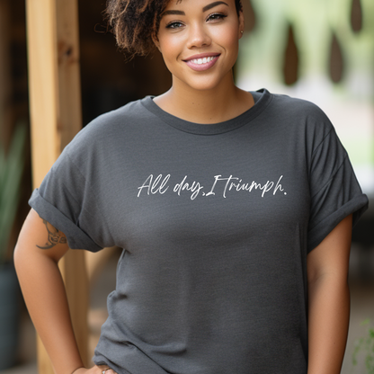 Sleek charcoal gray 'All Day I Triumph' t-shirt from Triumph Tees, designed to inspire courage and faith. Perfect faith apparel for those who believe in their God-given ability to triumph over adversities.