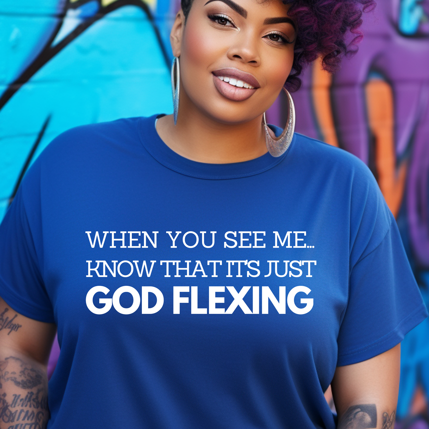 Stunning royal blue 'When You See Me Know That it's just God Flexing' T-shirt from Triumph Tees. This faith-inspired apparel is a modern way to show your belief and reverence for God.