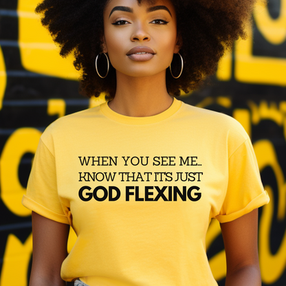 Eye-catching yellow 'When You See Me Know That it's just God Flexing' T-shirt from Triumph Tees. This faith-inspired apparel is a stylish way to express your spirituality and belief.