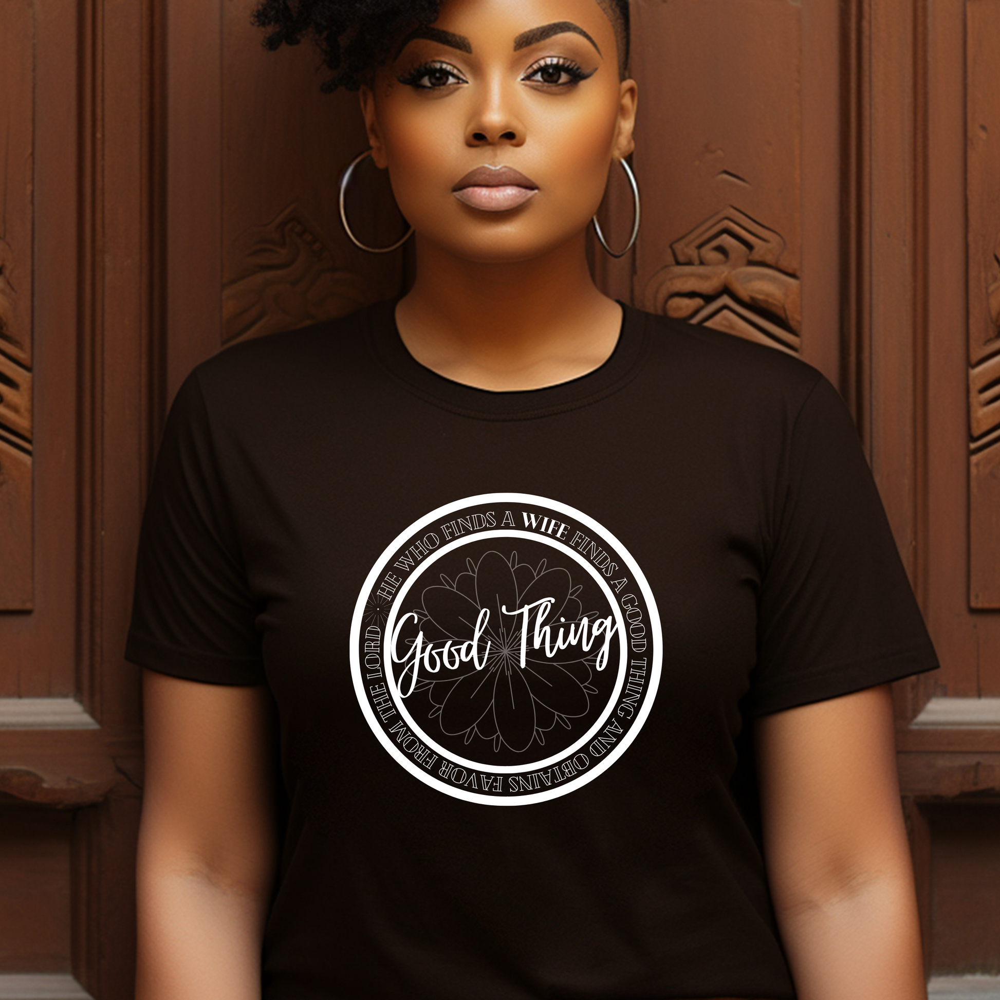 Stylish chocolate 'Good Thing' T-shirt from Triumph Tees, inspired by Proverbs 18:22. This faith-driven apparel is a trendy way to express your belief and the favor of God.