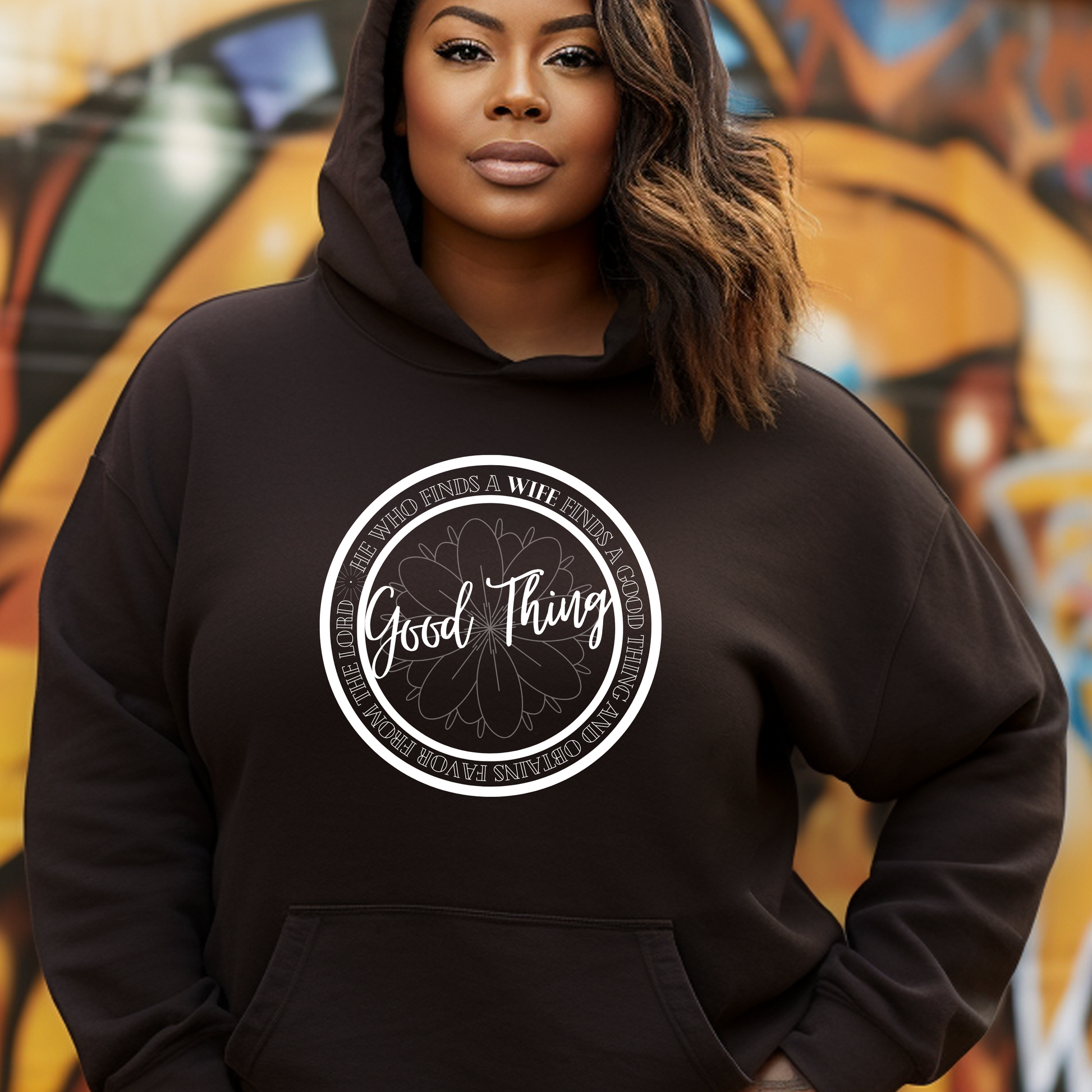 Fashionable chocolate 'Good Thing' hoodie from Triumph Tees, reflecting Proverbs 18:22. This faith-oriented apparel is a modern way to show your belief and God's favor.