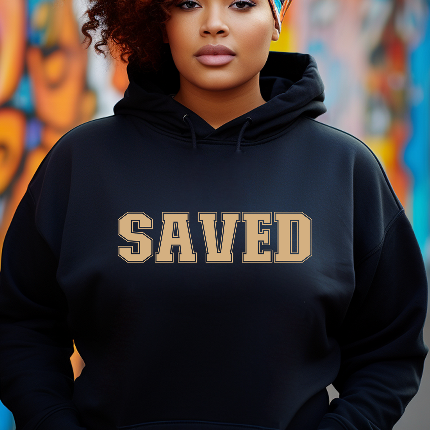 Shop Triumph Tees' black Saved pullover hoodie - a faith-inspired statement piece. Cozy, versatile, and available only at Triumph Tees. Elevate your style today!