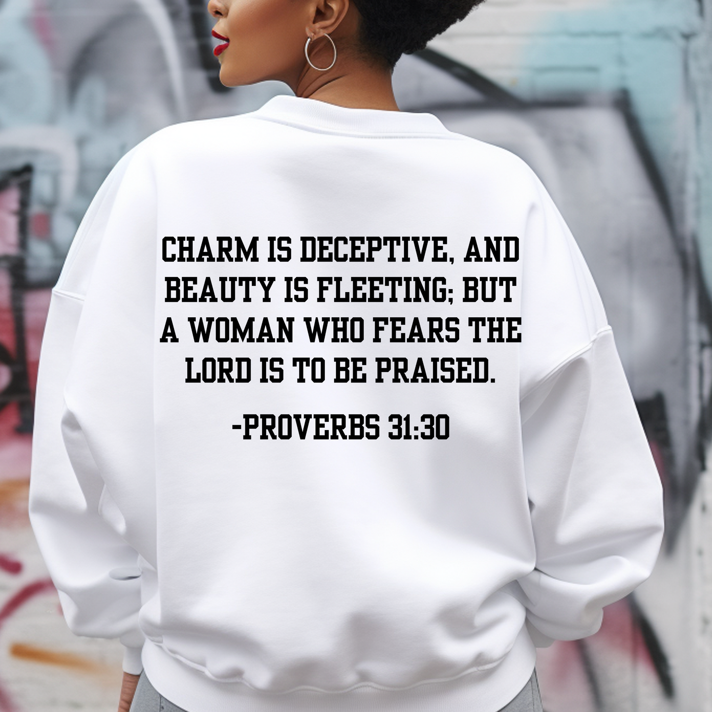 Contemporary white sweatshirt for women, featuring 'Woman of God' art on the front and Proverbs 31:30 scripture on the back. Embrace style and faith with this unique design.